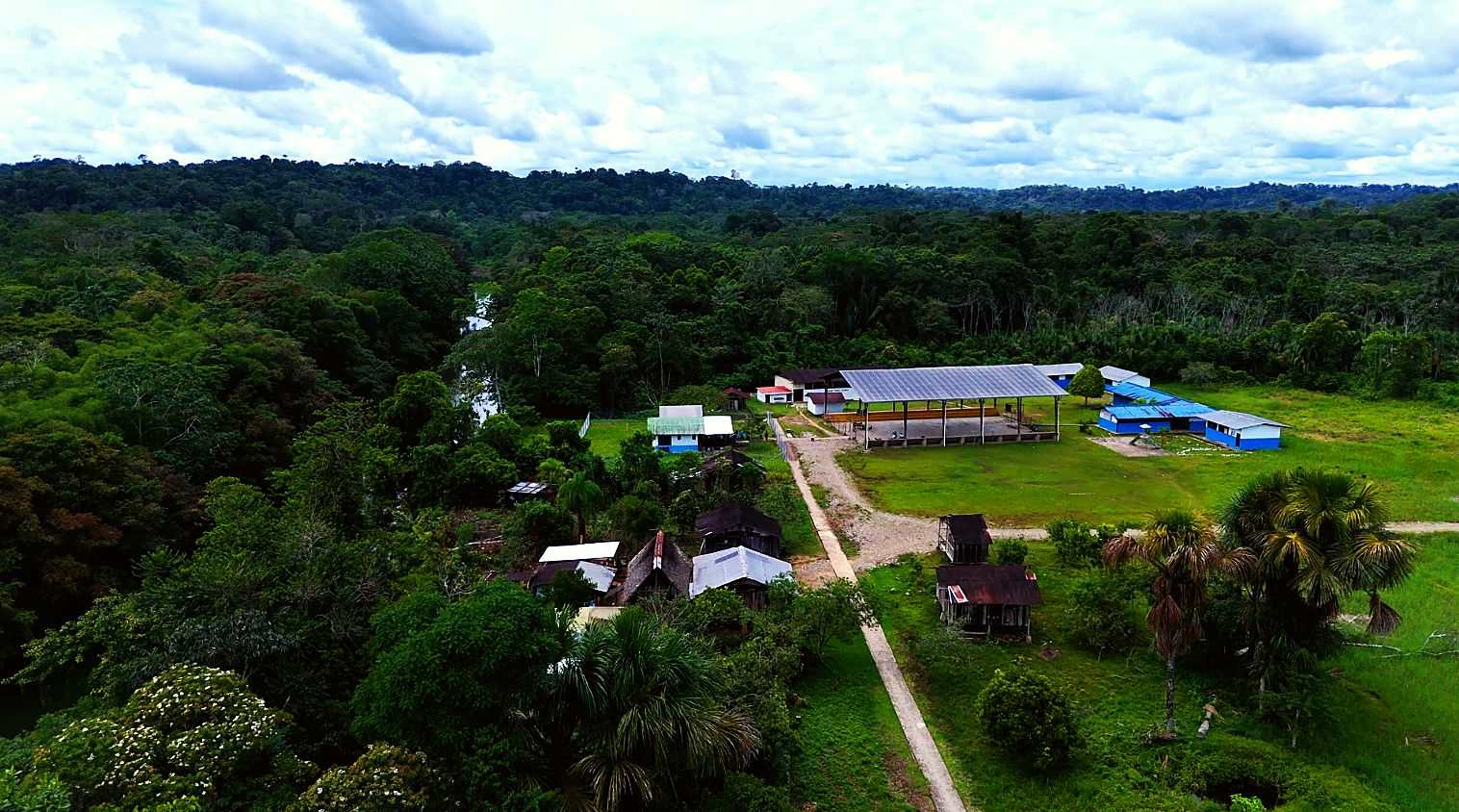 Aerial view of Verde Sumaco with the covered stadium Guild built and other buildings